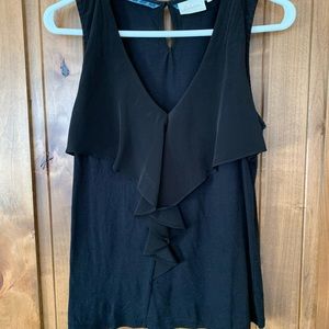 Black top with ruffle front